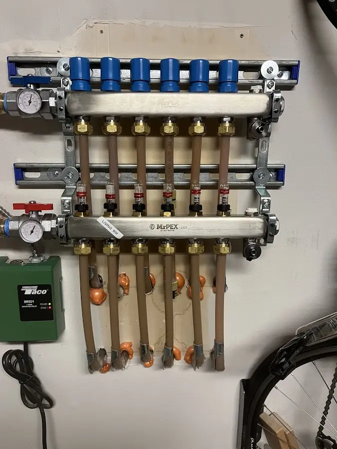 Plumber performing Water Heater Repair at a residential property in Barrington